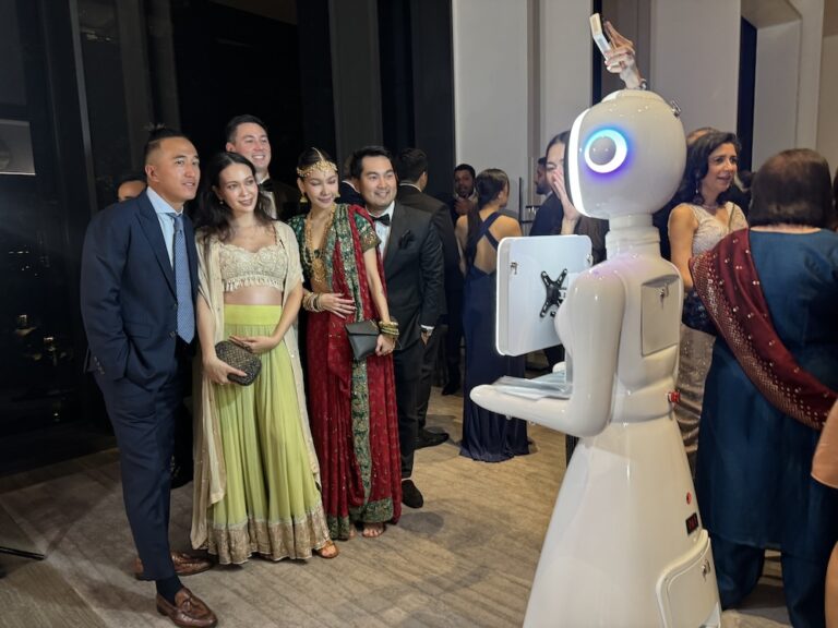 Robot photo booth rental Thailand moving through event venue